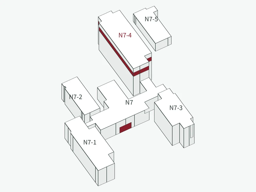 Massing model of the KAIST Mechanical Engineering complex. Five wings around a central spine; the laboratory is in N7-4, the tallest, with its sixth floor and the main entrance marked.